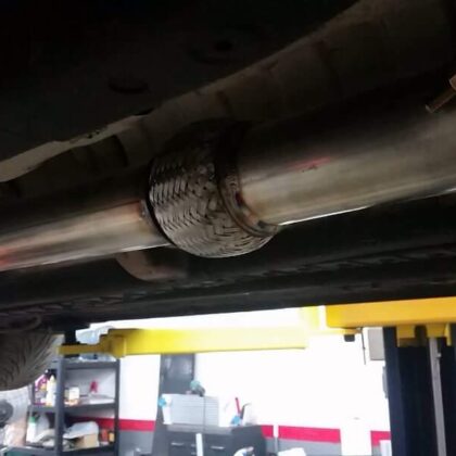 Mid car dump exhaust